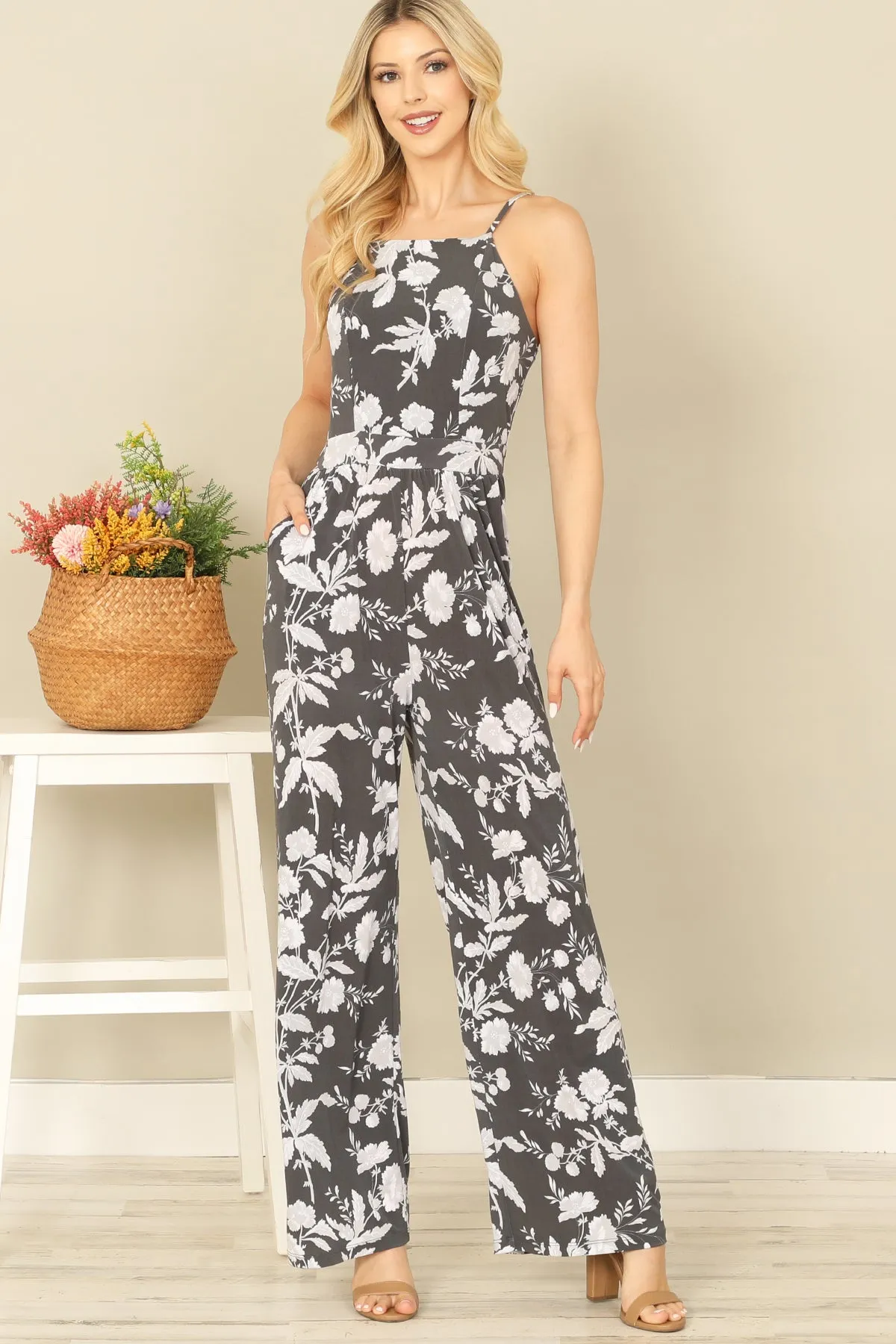 SPAGHETTI STRAP SIDE POCKET FLORAL JUMPSUIT